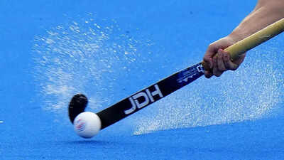 Hockey players in action on the field